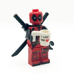 The Brick Show Shop I Like ME Heart Mug (from Deadpool 3) for Minifigs made using LEGO par