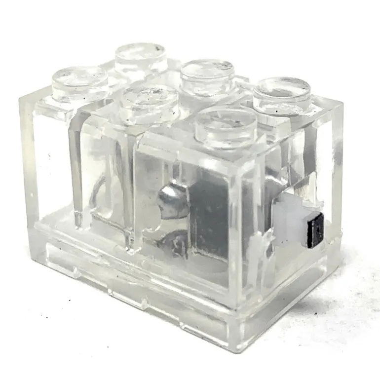 The Brick Show Shop Light-Up 2x3 Brick (Flashing Multi Colored Light) - Compatible w/ LEGO