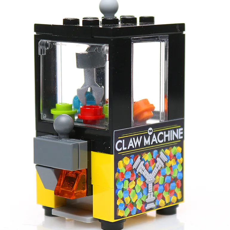 The Brick Show Shop Minifig-Scale Arcade Claw Machine Building Set made from LEGO parts