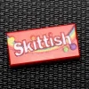 The Brick Show Shop Skittish - Custom Printed Candy 1x2 Tile made using LEGO part